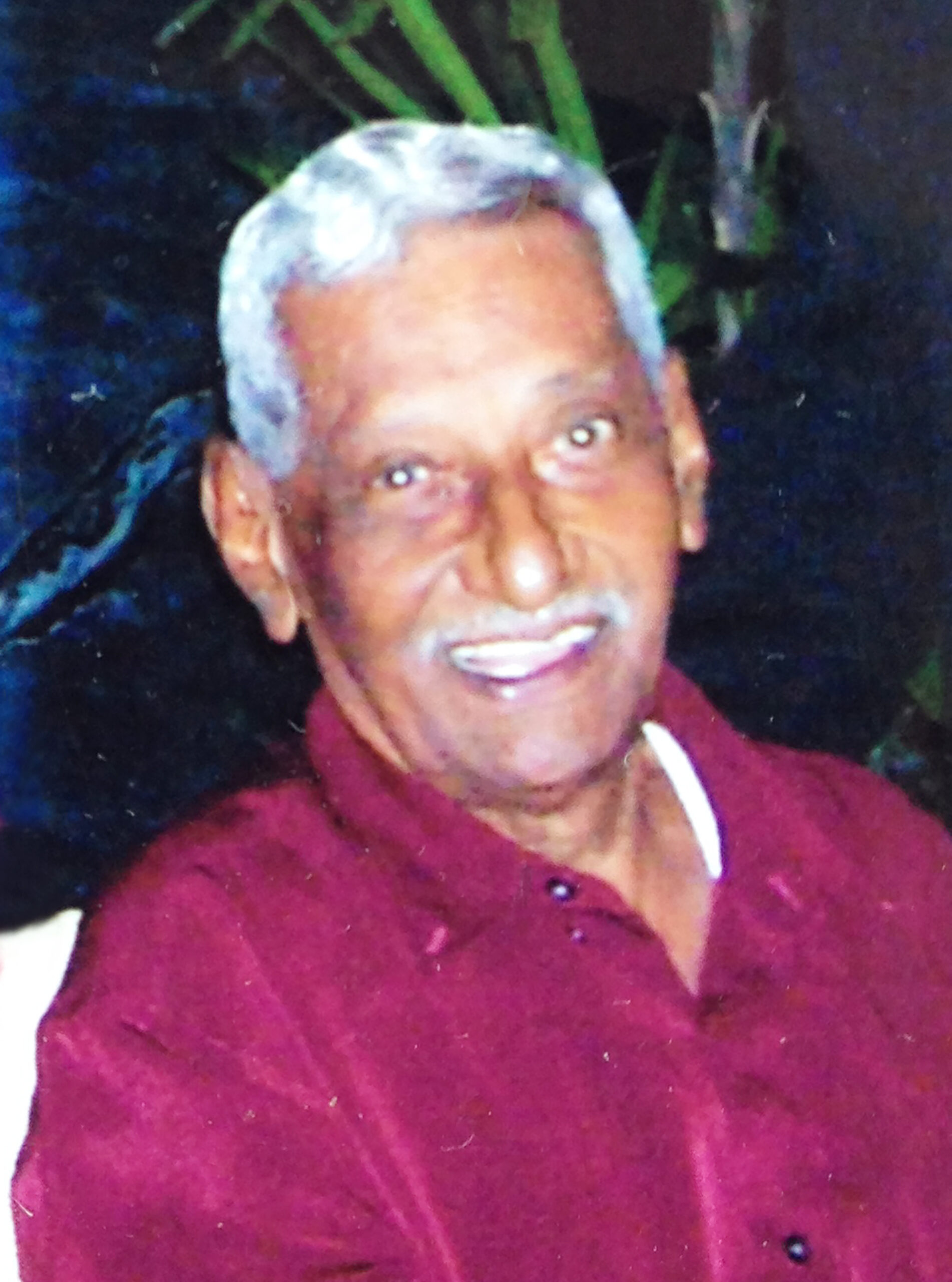 OLIVER E.J. SAMUEL
