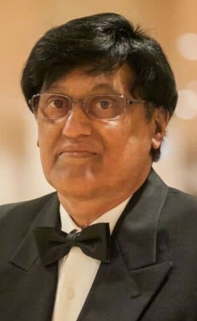 DR. RAJAN JOHN