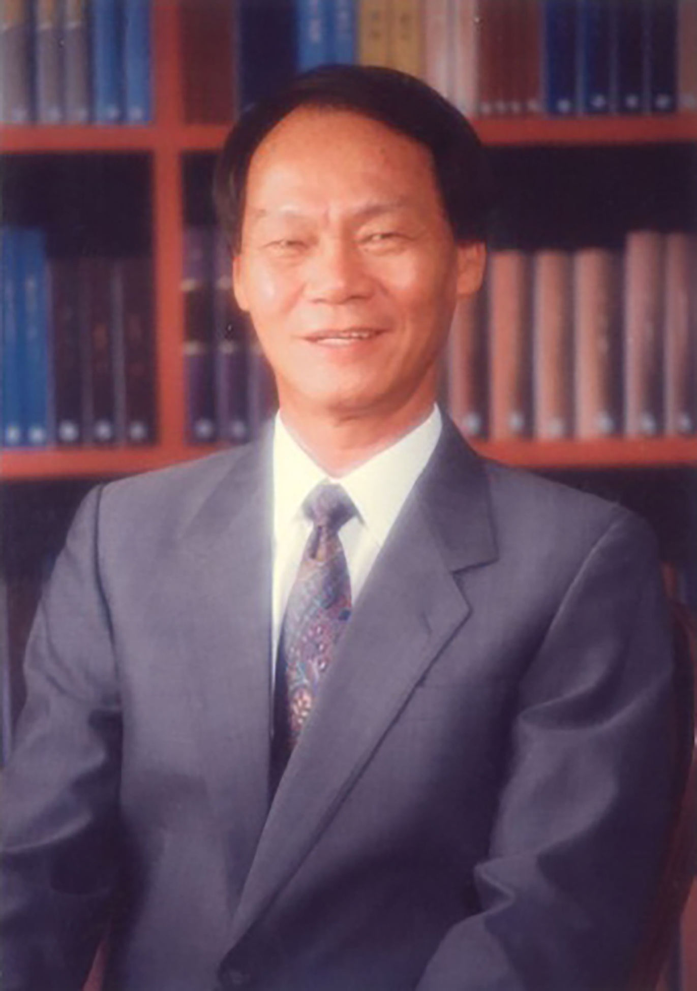 Mr Looi Kum Pak